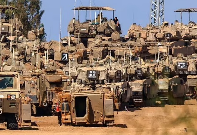 Ready to go in Ground invasion looms as Israeli tanks line up on Gaza