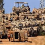 Ready to go in Ground invasion looms as Israeli tanks line up on Gaza